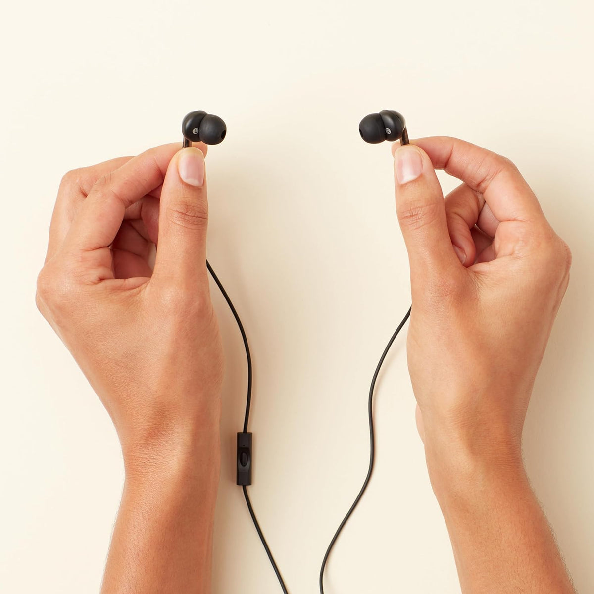 Amazon Basics Wired Earbuds with Microphone, In Ear Headphones, 3.5mm Jack, 4.2 ft long cable, S/M/L Ear Tips, Black